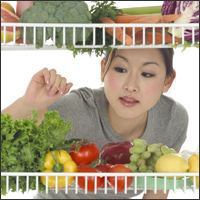 Woman choosing vegetables
