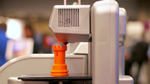 Photo of 3-D printer in action