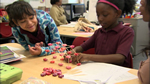Photo of children experimenting in a classroom