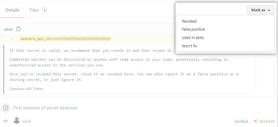 Drop-down menu for resolving an alert from secret scanning
