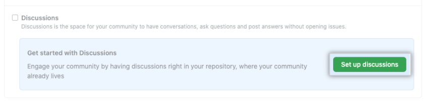 Botón "Set up discussions" (Configurar debates) en "Features" (Características) para habilitar o deshabilitar los debates de GitHub en un repositorio